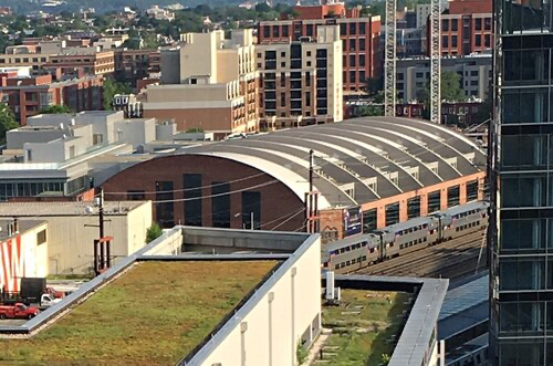 View over NoMA from Washington Gateway, looking down on the Union Station rail shed